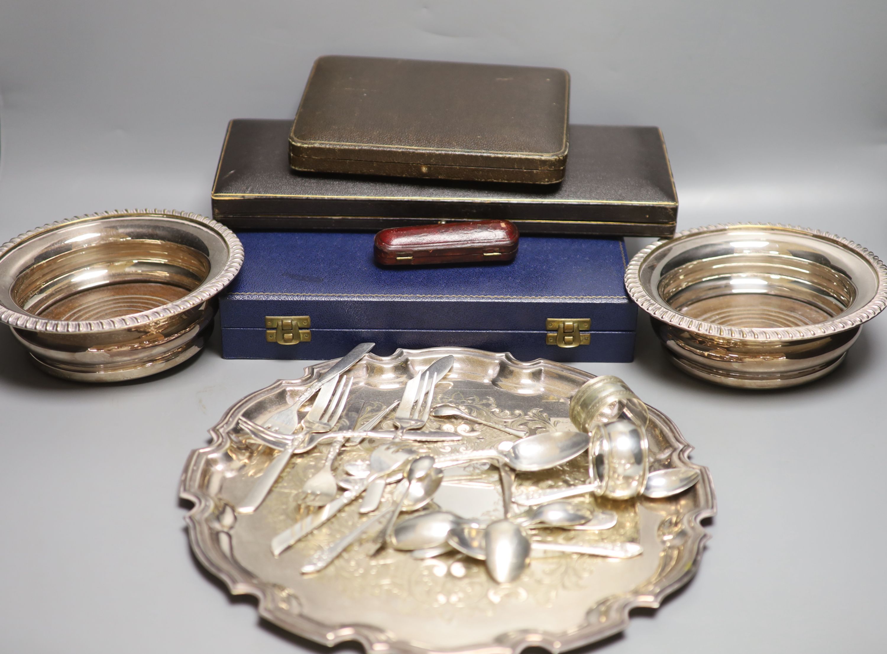 A silver-mounted amber cheroot holder, cased, with Russian inscription, Birmingham 1896 and sundry silver and plated flatware,